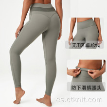 top corto con leggings de cintura alta